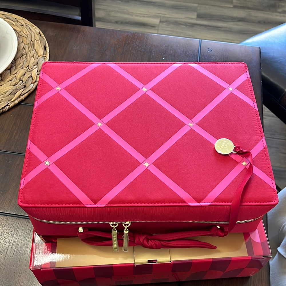 Red candy travel case brand new Estée Lauder